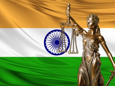 india flag and statue of blind lady justice ( themis )